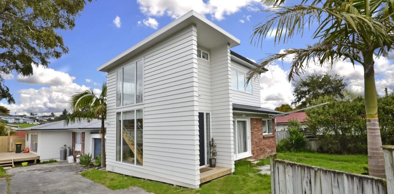 Recladding house in North Shore 